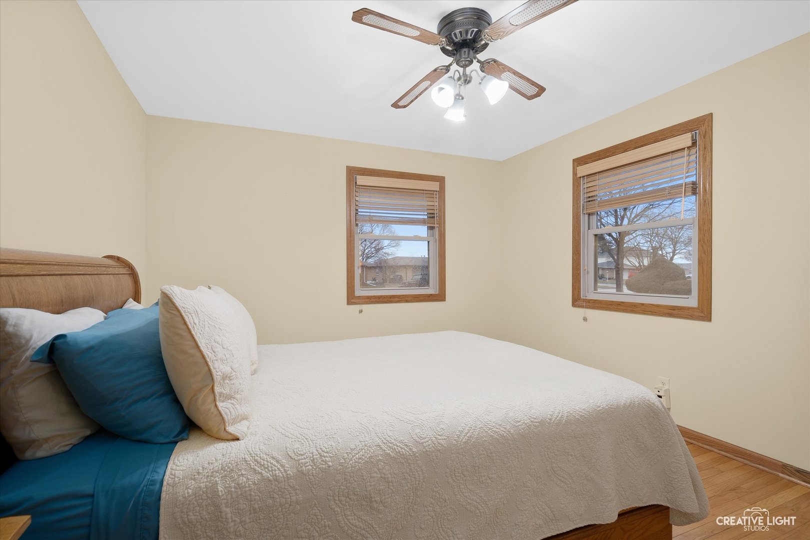 131 Terry Drive Sugar Grove, IL 60554 - Photo 9 of 27 a bedroom with a bed and a painting on the wall