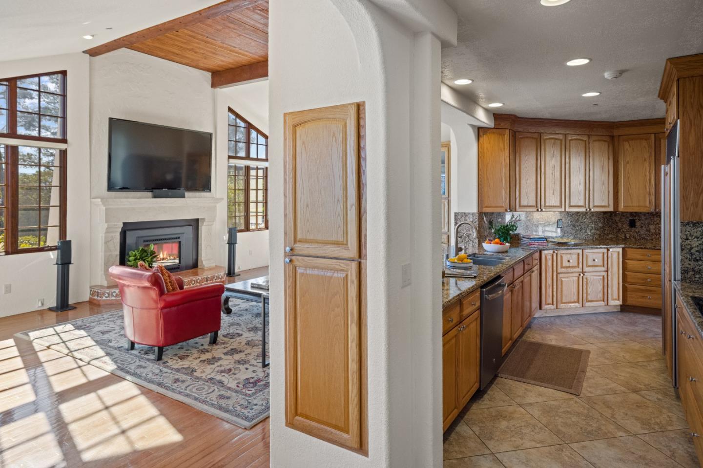 12365 Saddle Road Carmel Valley, CA 93924 - Photo 13 of 65 a kitchen with stainless steel appliances granite countertop a refrigerator stove top oven and sink