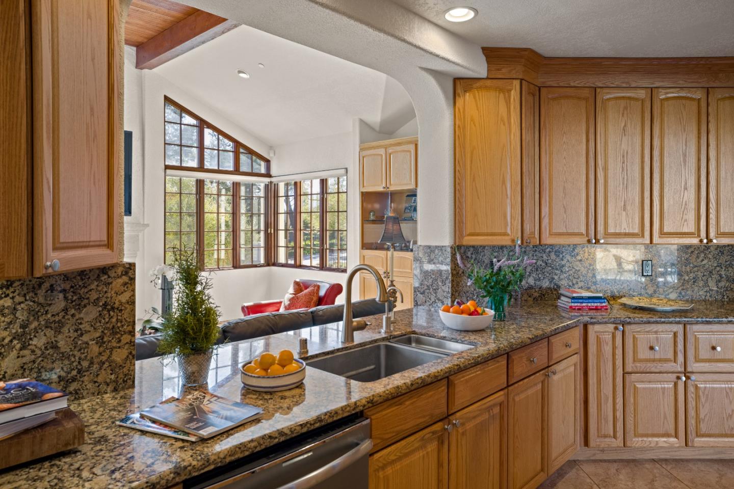12365 Saddle Road Carmel Valley, CA 93924 - Photo 14 of 65 a kitchen with a sink and cabinets