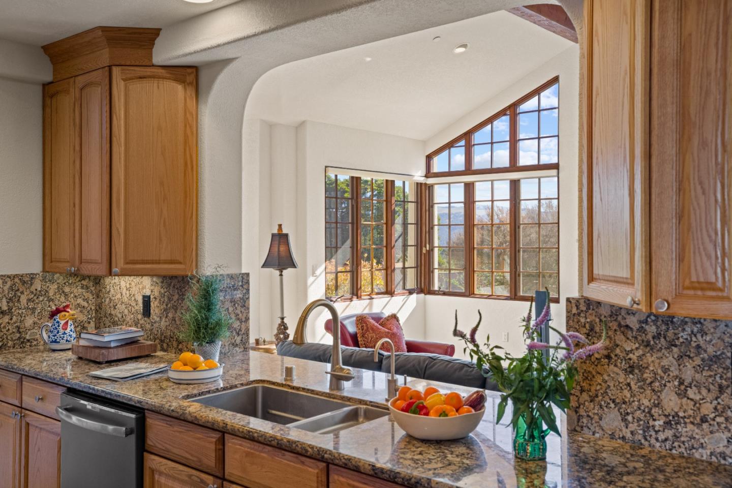 12365 Saddle Road Carmel Valley, CA 93924 - Photo 15 of 65 a kitchen with sink refrigerator and window