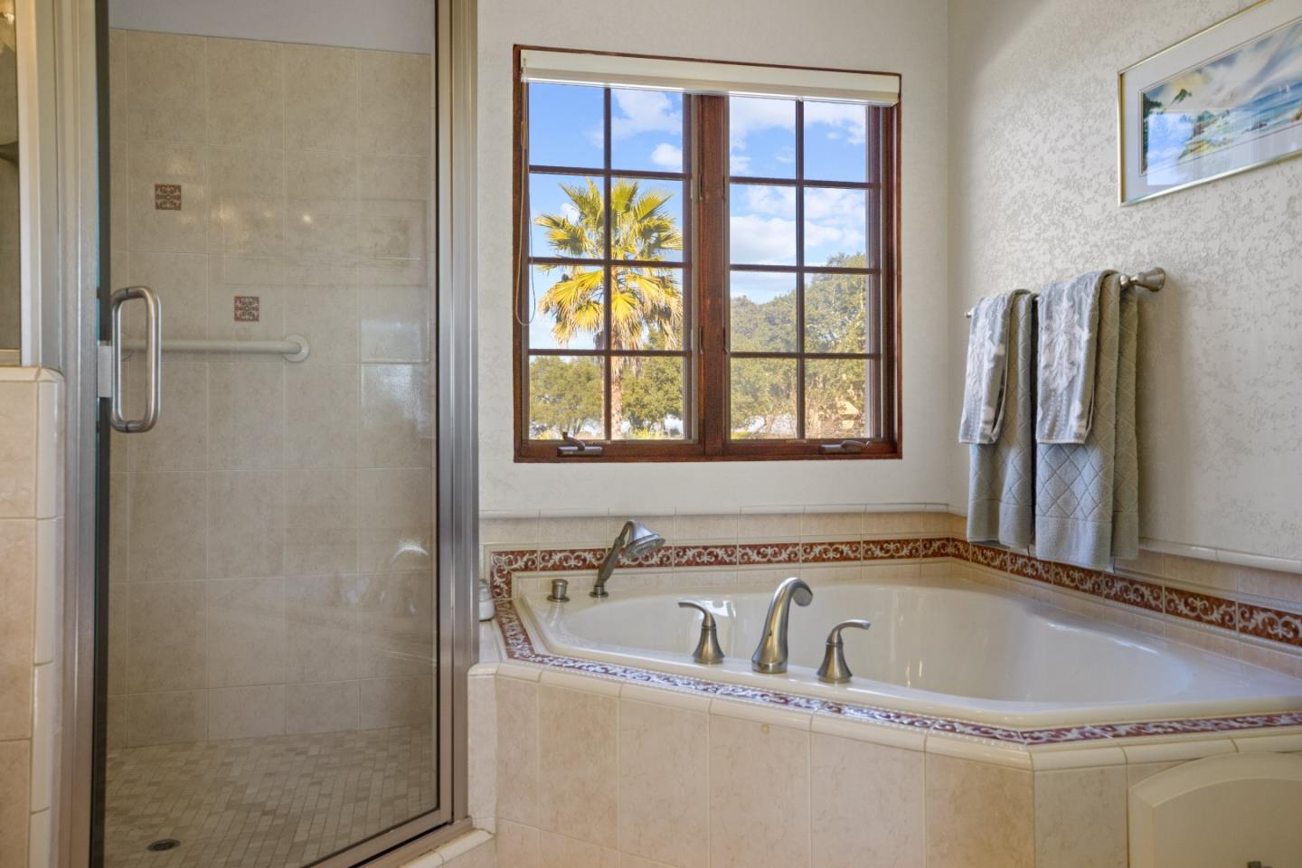 12365 Saddle Road Carmel Valley, CA 93924 - Photo 27 of 65 a bath tub sitting next to a window