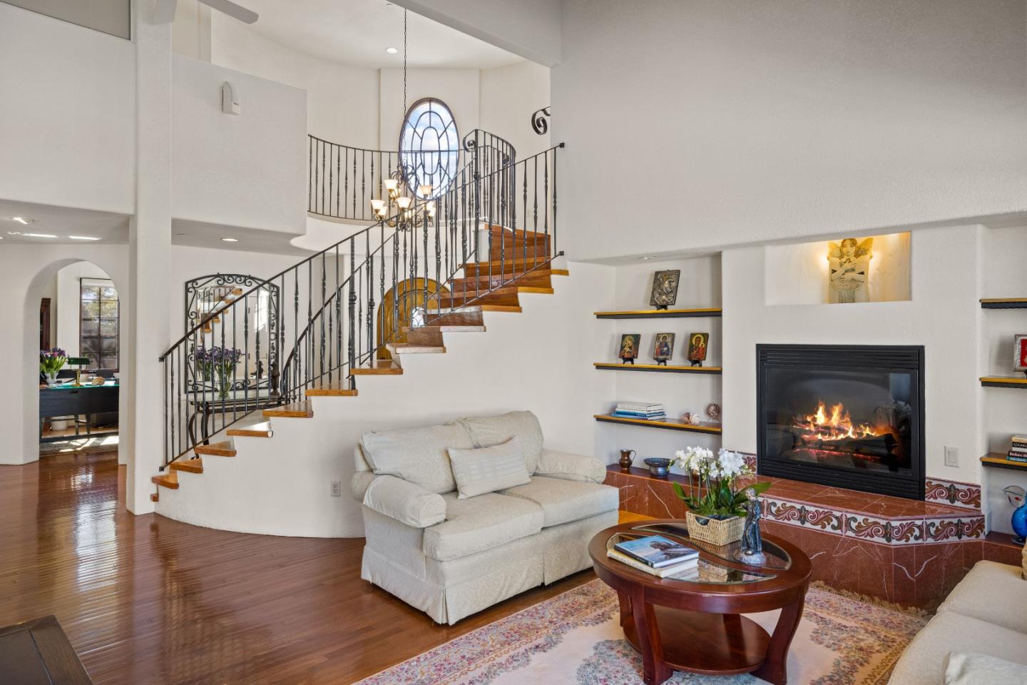 12365 Saddle Road Carmel Valley, CA 93924 - Photo 34 of 65 a living room with fireplace furniture and a wooden floor