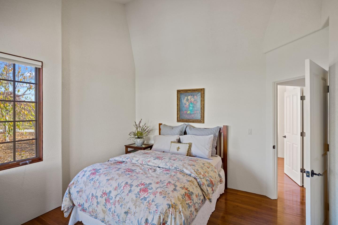12365 Saddle Road Carmel Valley, CA 93924 - Photo 36 of 65 a bedroom with a bed and a window