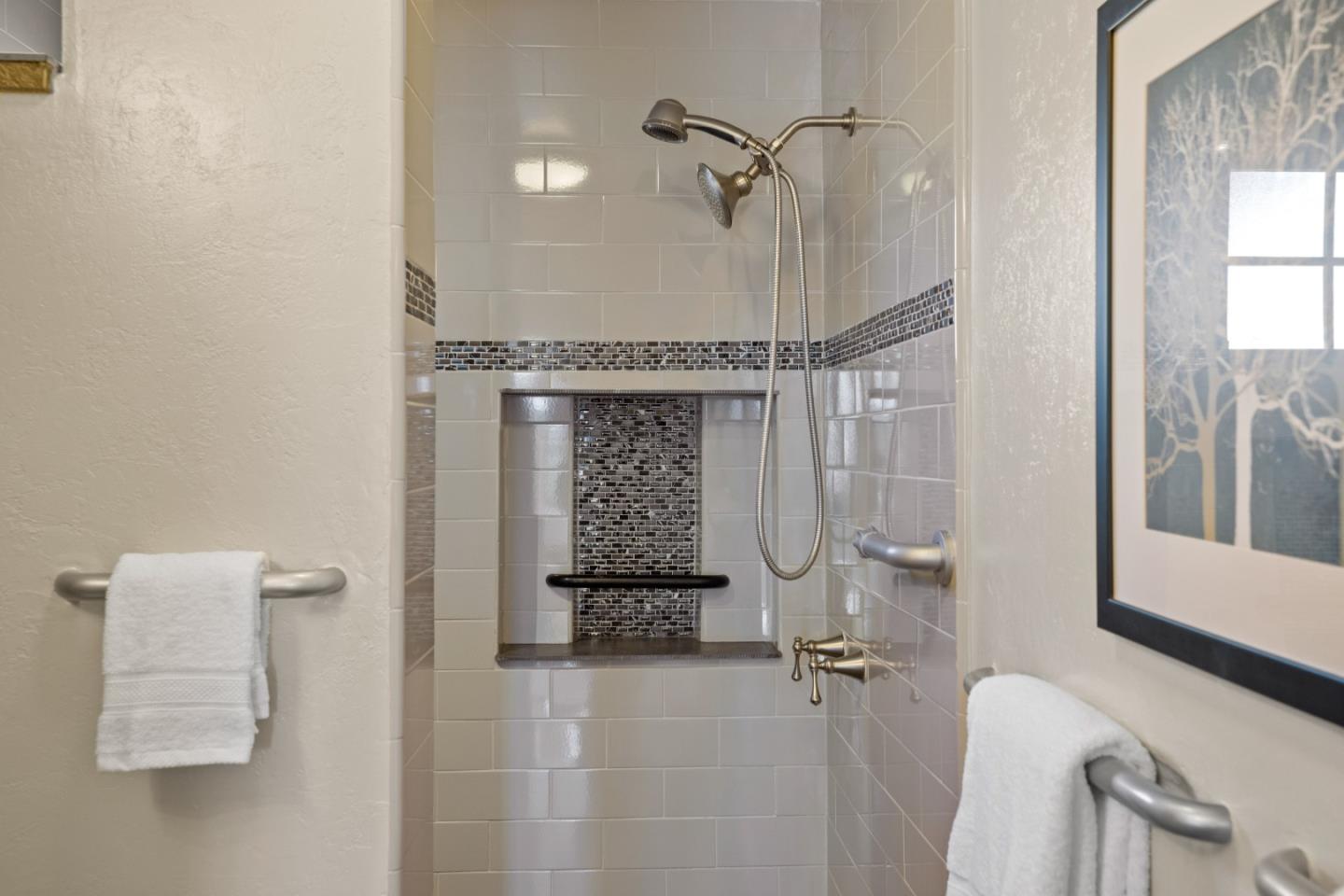 12365 Saddle Road Carmel Valley, CA 93924 - Photo 40 of 65 a bathroom with a granite countertop sink a mirror and shower