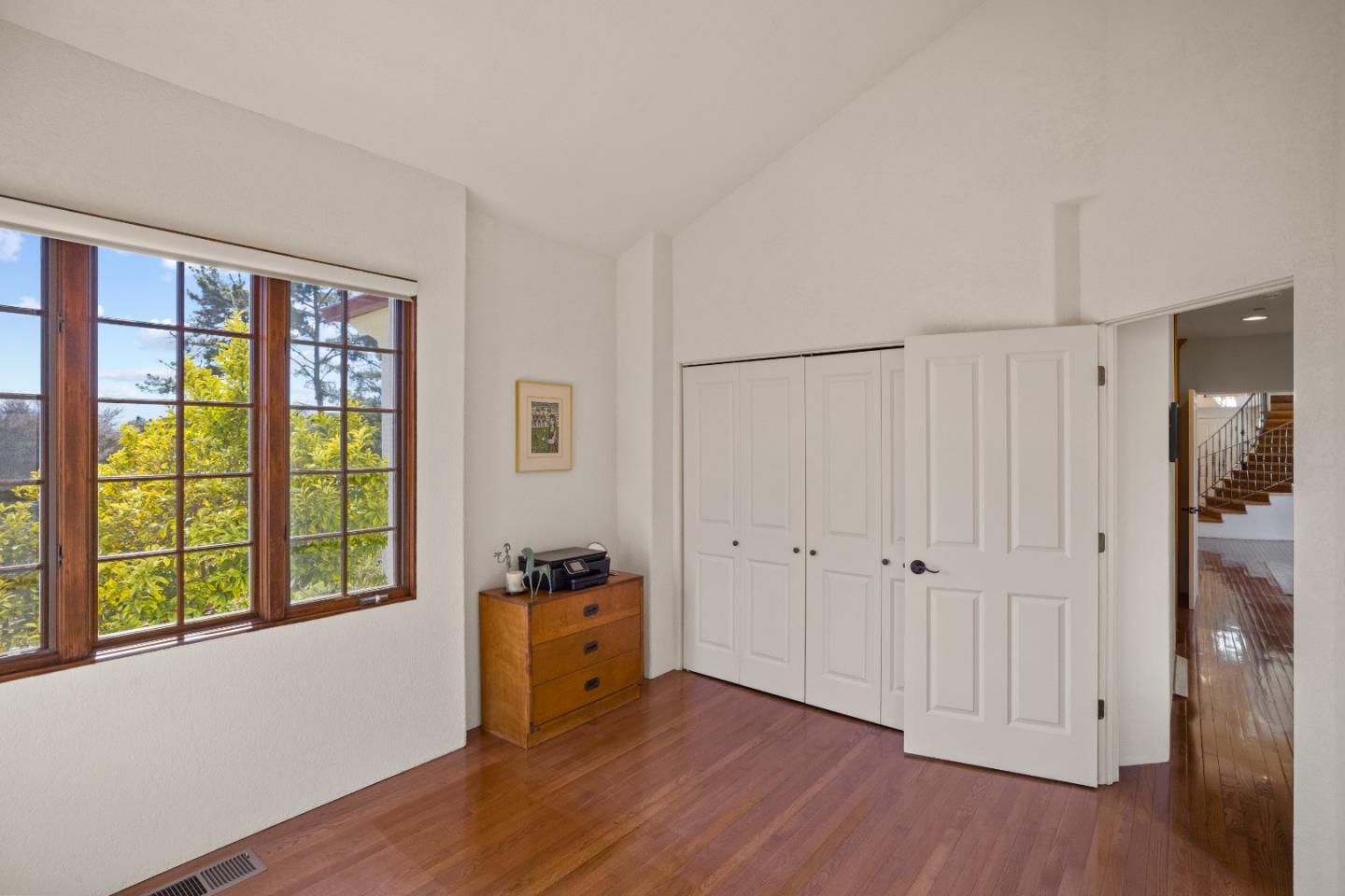 12365 Saddle Road Carmel Valley, CA 93924 - Photo 46 of 65 a view of an empty room with closet and a window