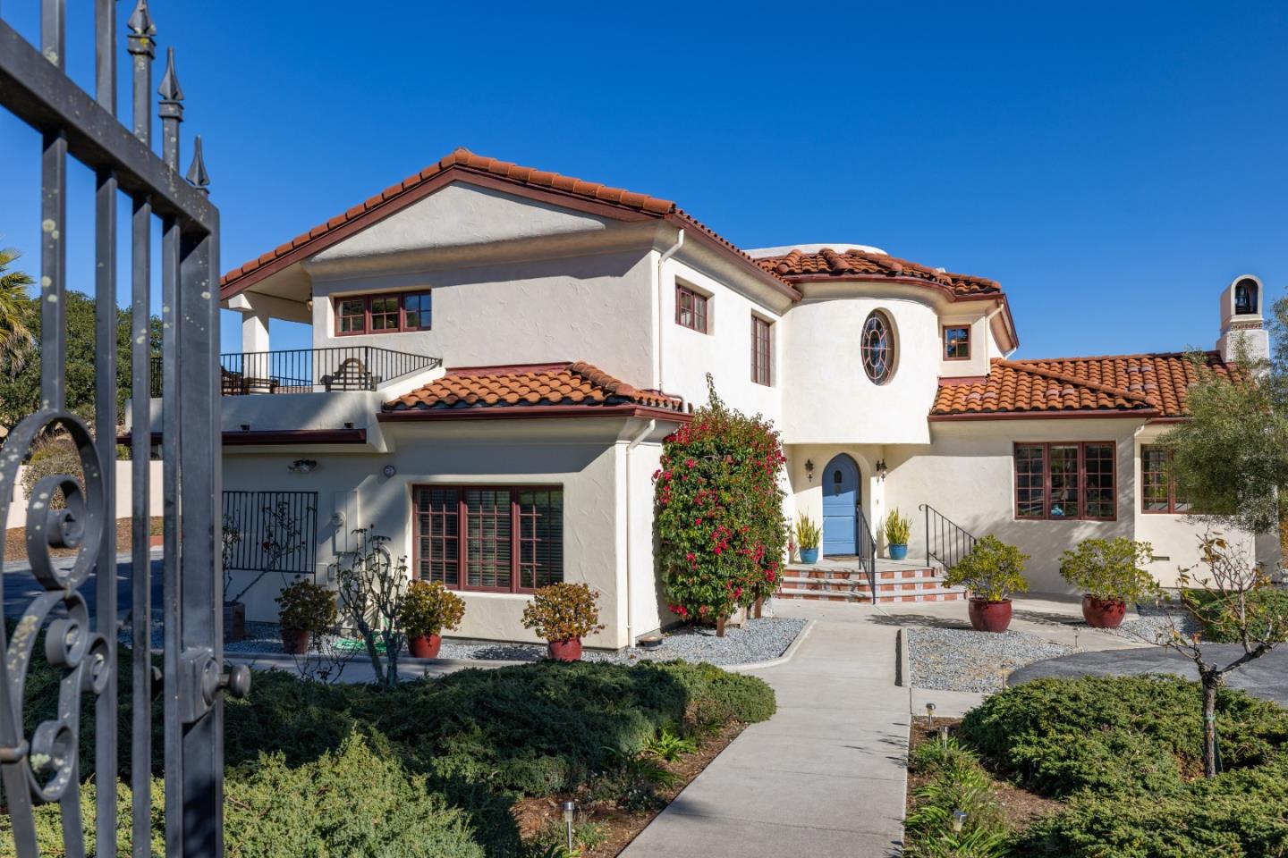 12365 Saddle Road Carmel Valley, CA 93924 - Photo 49 of 65 a front view of a house with a yard
