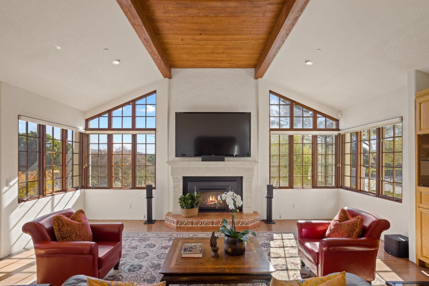 12365 Saddle Road Carmel Valley, CA 93924 - Photo 6 of 65 a living room with furniture large window and a fireplace
