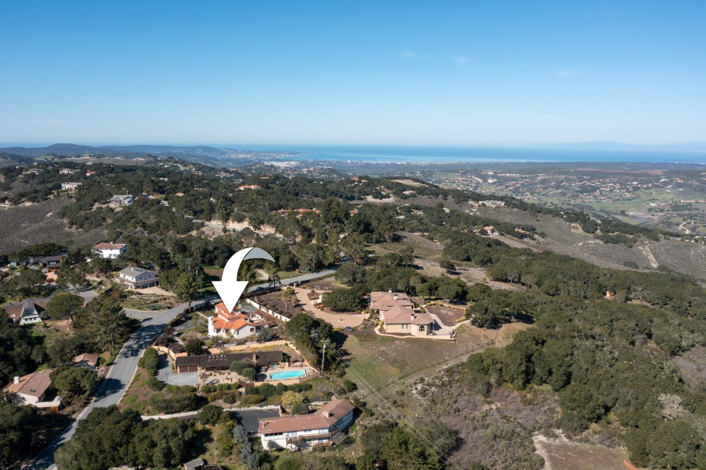 12365 Saddle Road Carmel Valley, CA 93924 - Photo 64 of 65 an aerial view of a house with a city view