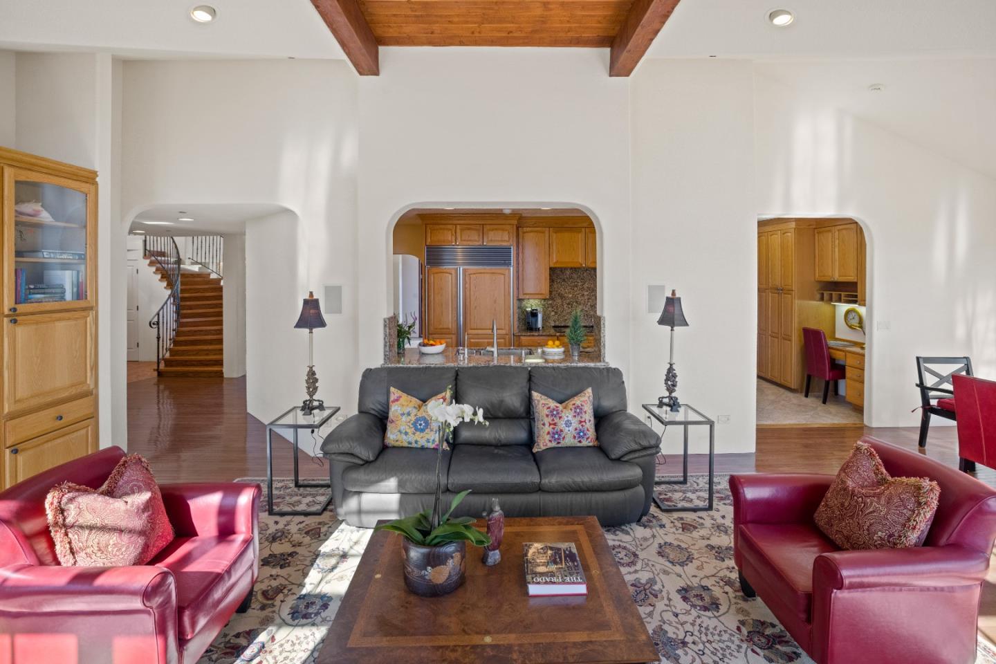 12365 Saddle Road Carmel Valley, CA 93924 - Photo 10 of 65 a living room with furniture potted plant and kitchen view