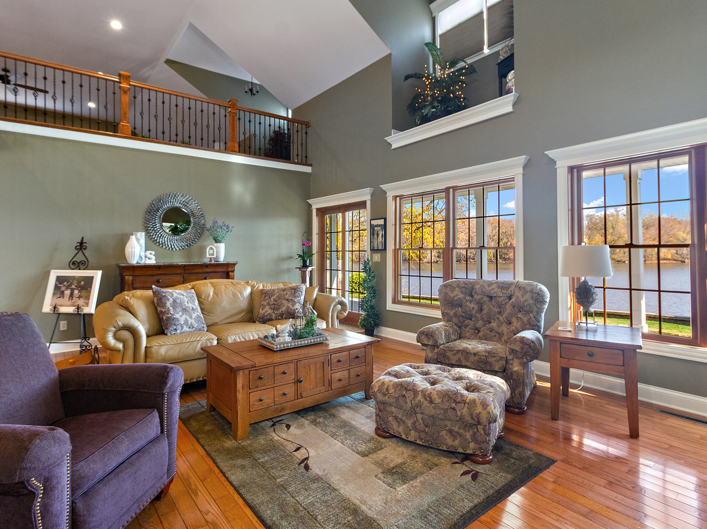 3157 River Road Kankakee, IL 60901 - Photo 12 of 50 a living room with furniture and a floor to ceiling window