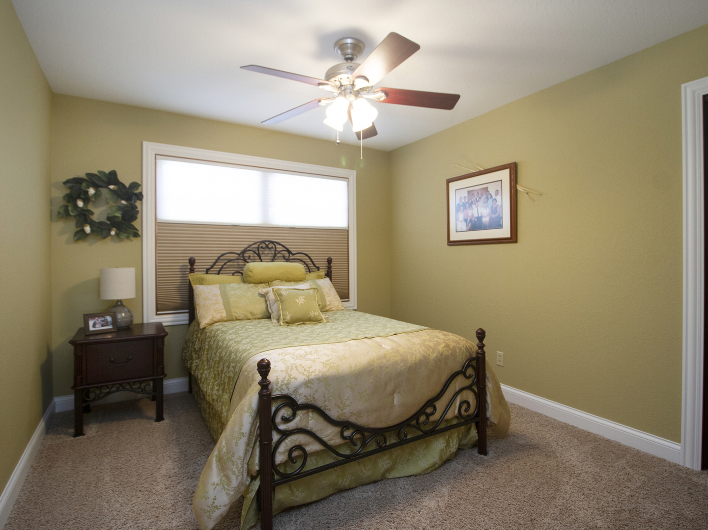 3157 River Road Kankakee, IL 60901 - Photo 20 of 50 a bedroom with a bed and a chandelier