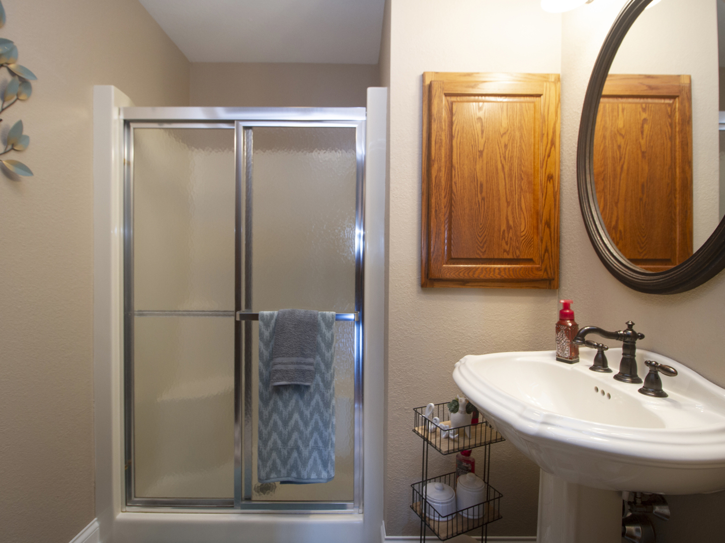 3157 River Road Kankakee, IL 60901 - Photo 22 of 50 a bathroom with a sink and a mirror