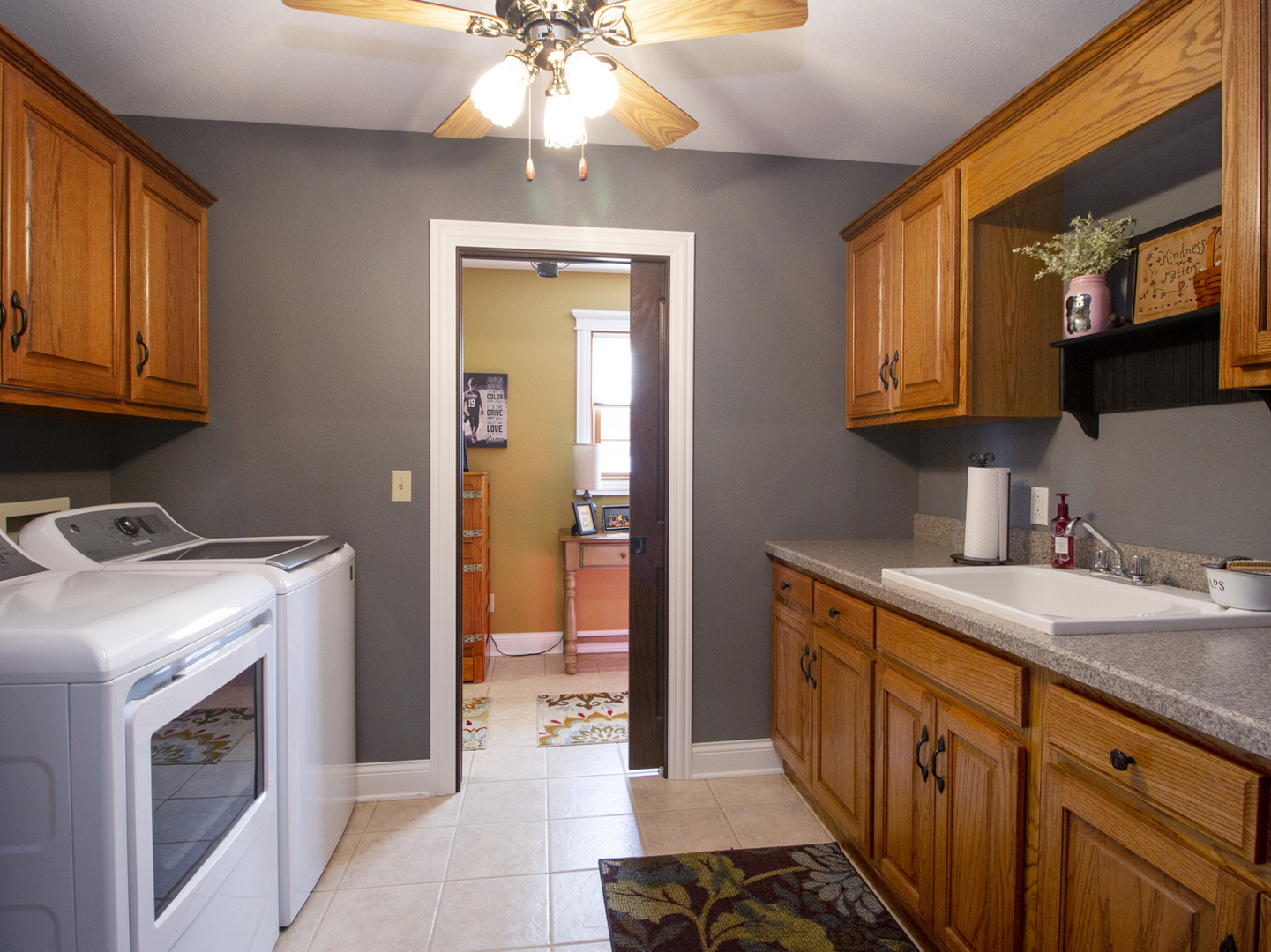 3157 River Road Kankakee, IL 60901 - Photo 30 of 50 a kitchen with stainless steel appliances granite countertop a sink a stove and a refrigerator