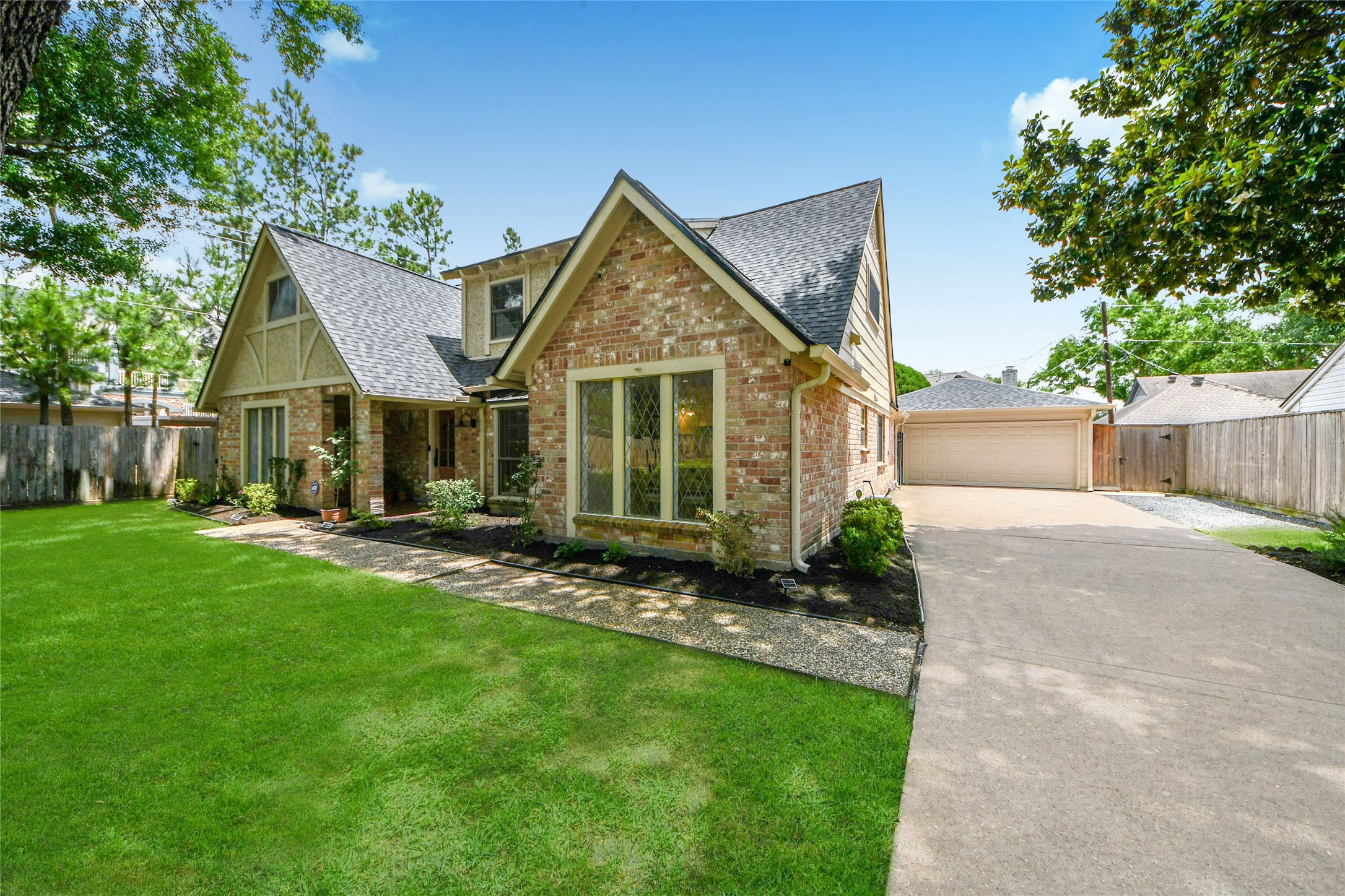 3030 Bernadette Lane Houston, TX 77043 - Photo 2 of 31 a view of a house with a back yard