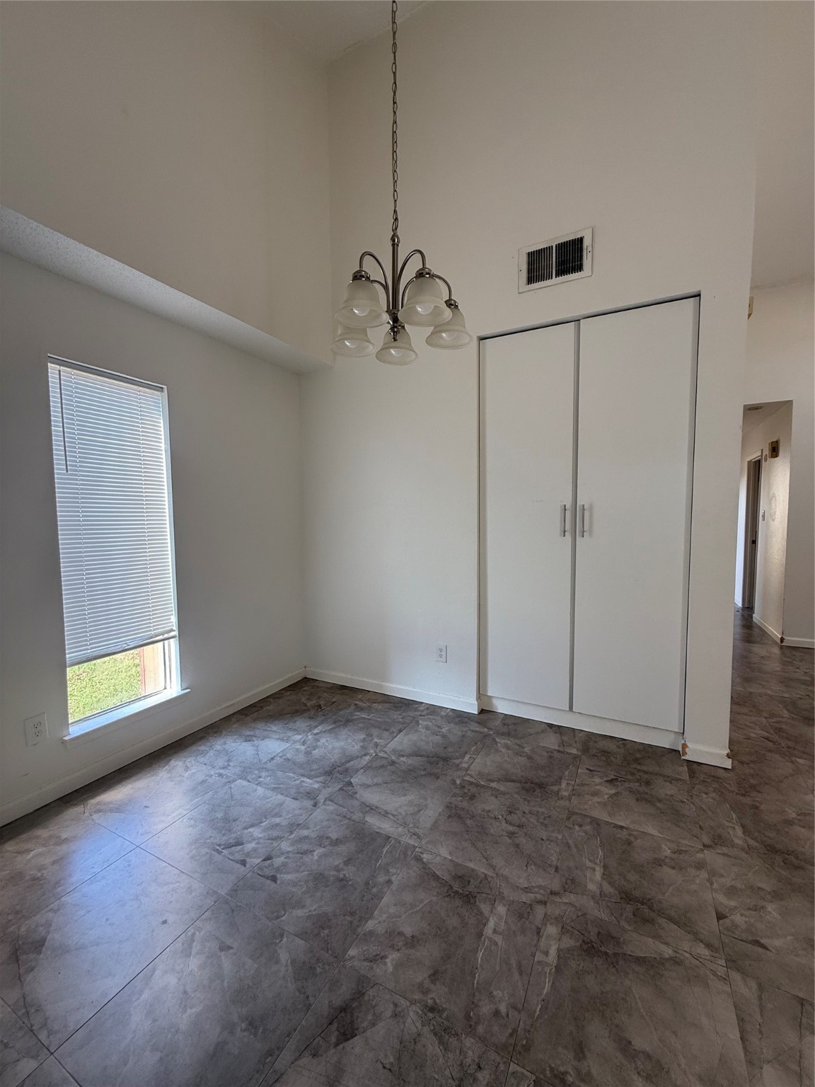 12550 Newbrook Drive Houston, TX 77072 - Photo 13 of 15 a view of an empty room with a window