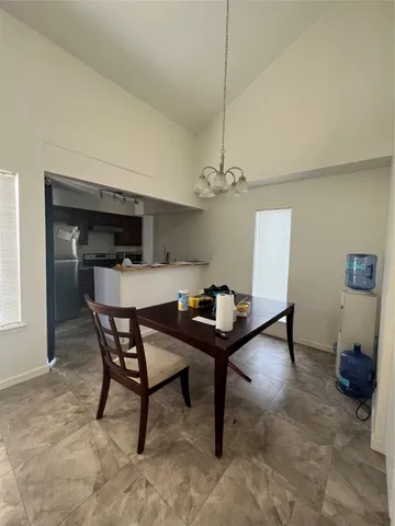 a view of a dining room with furniture