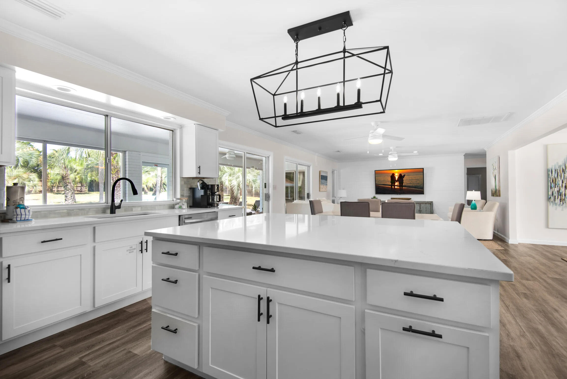 58 Overlook Drive Destin, FL 32550 - Photo 30 of 48 a kitchen with cabinets stainless steel appliances and a chandelier