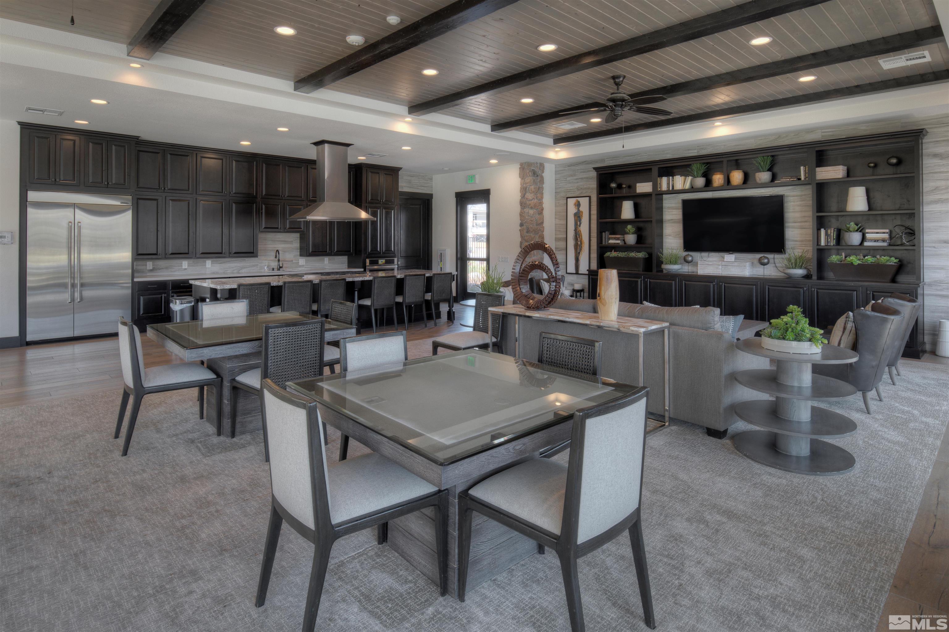 9404 Flying Horse Road Reno, NV 89521 - Photo 38 of 40 a kitchen with a dining table chairs and a stove