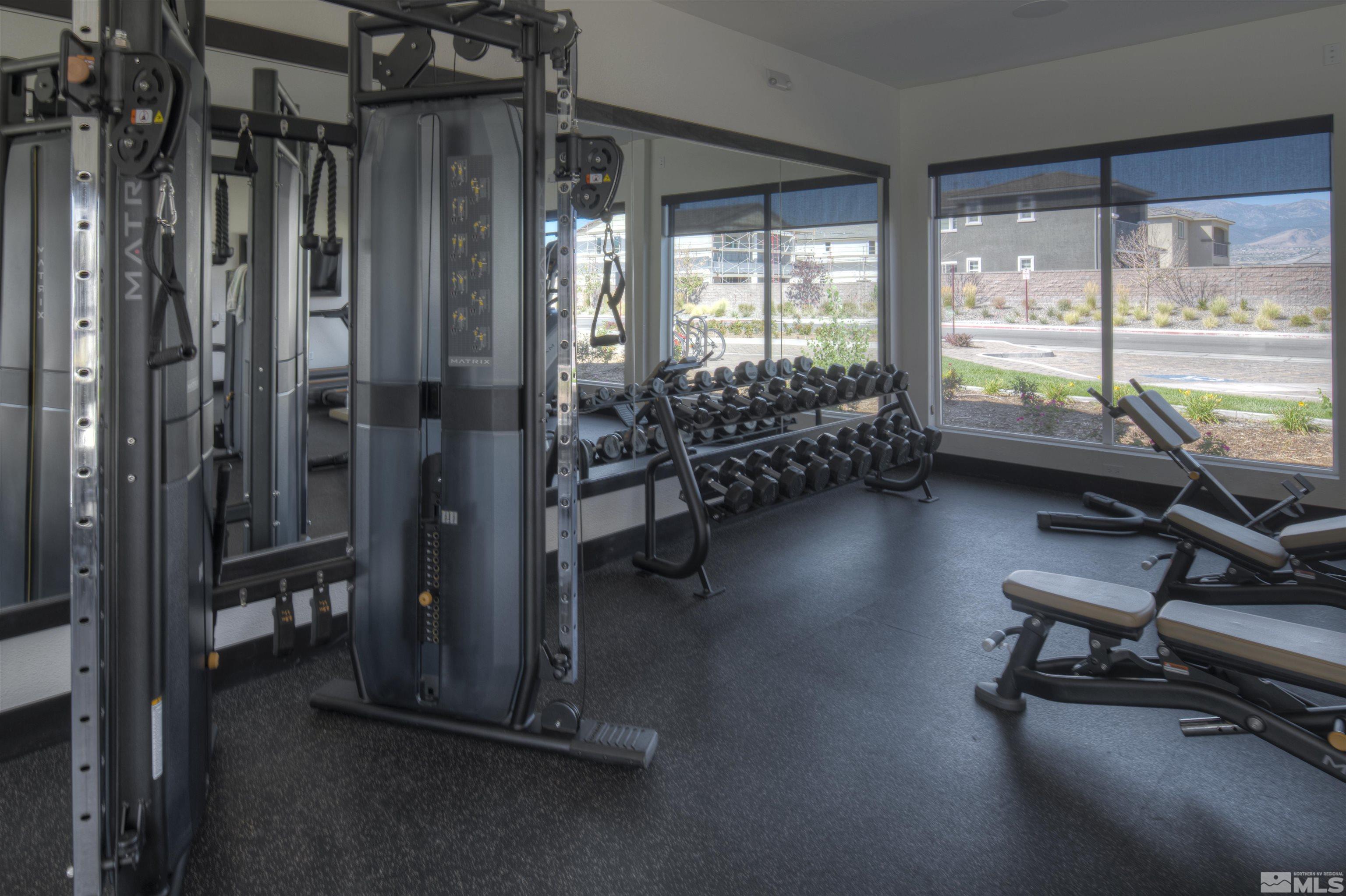 9404 Flying Horse Road Reno, NV 89521 - Photo 39 of 40 a gym room with gym equipment and large window
