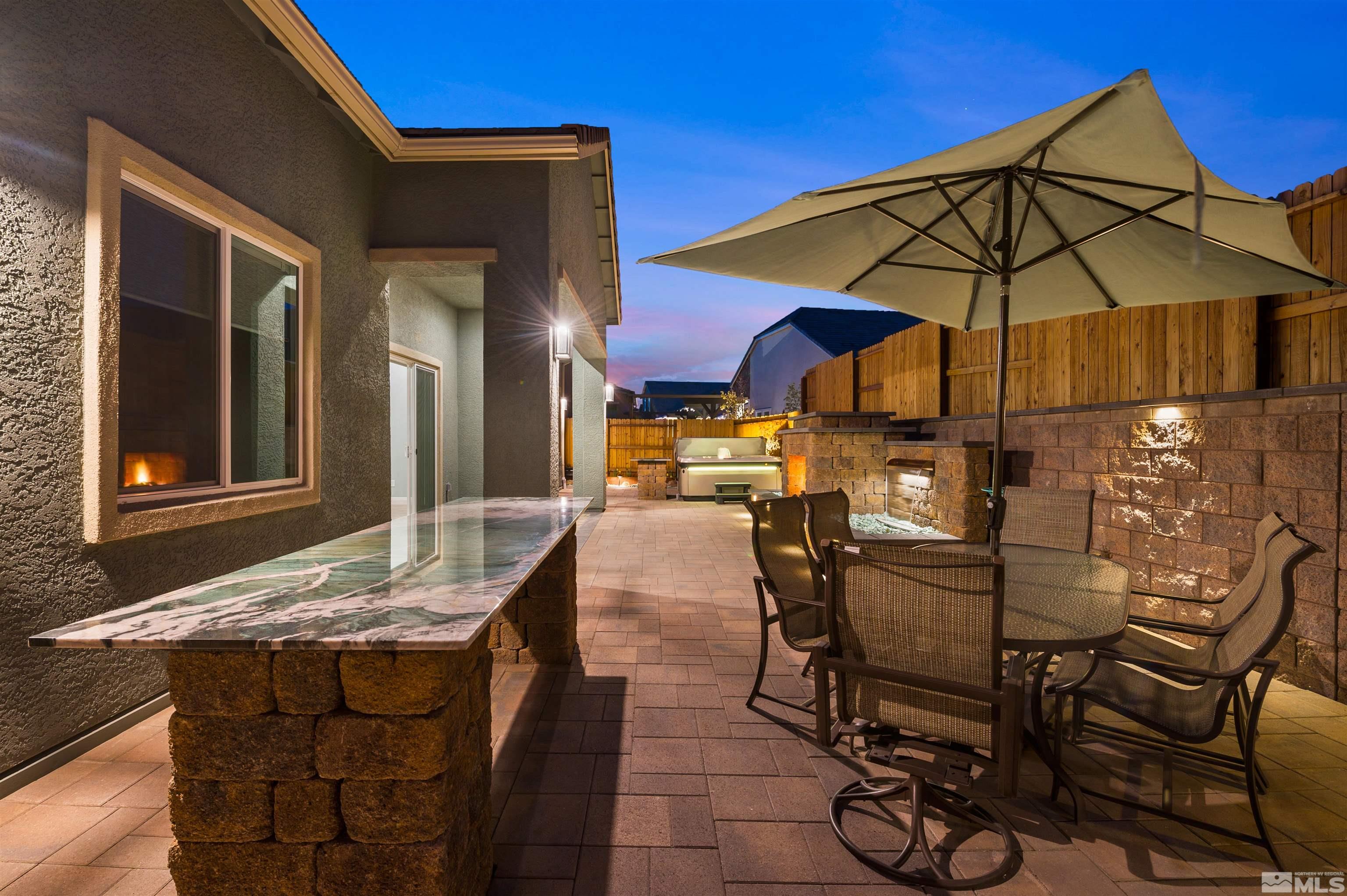9404 Flying Horse Road Reno, NV 89521 - Photo 6 of 40 a view of an outdoor space with dining area and furniture