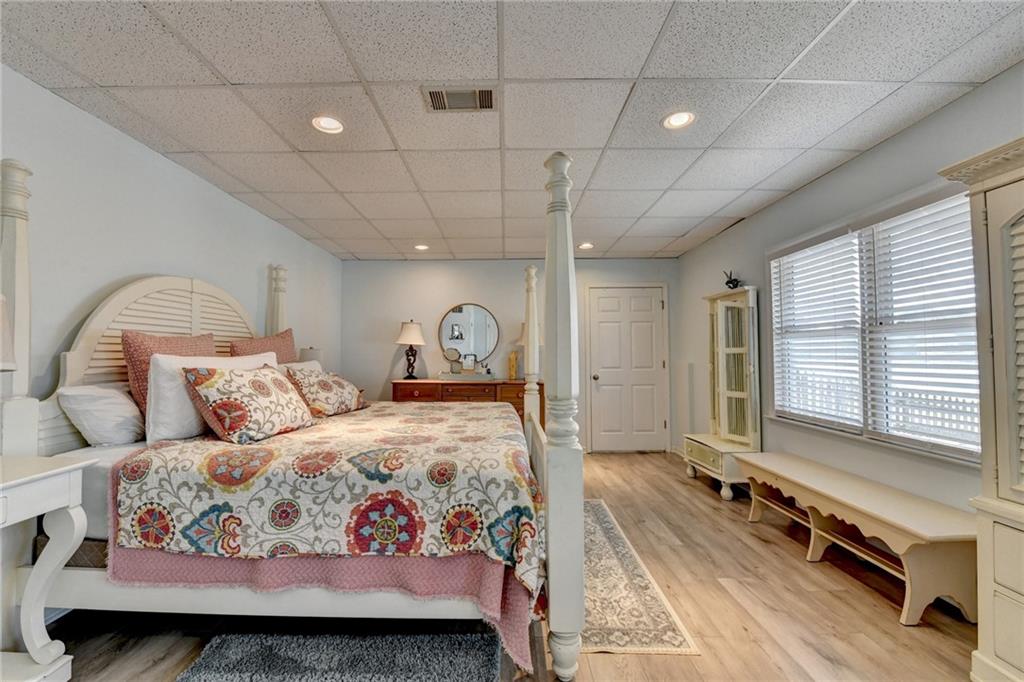 2152 Merrymount Drive Suwanee, GA 30024 - Photo 40 of 63 a bedroom with a large bed and a window