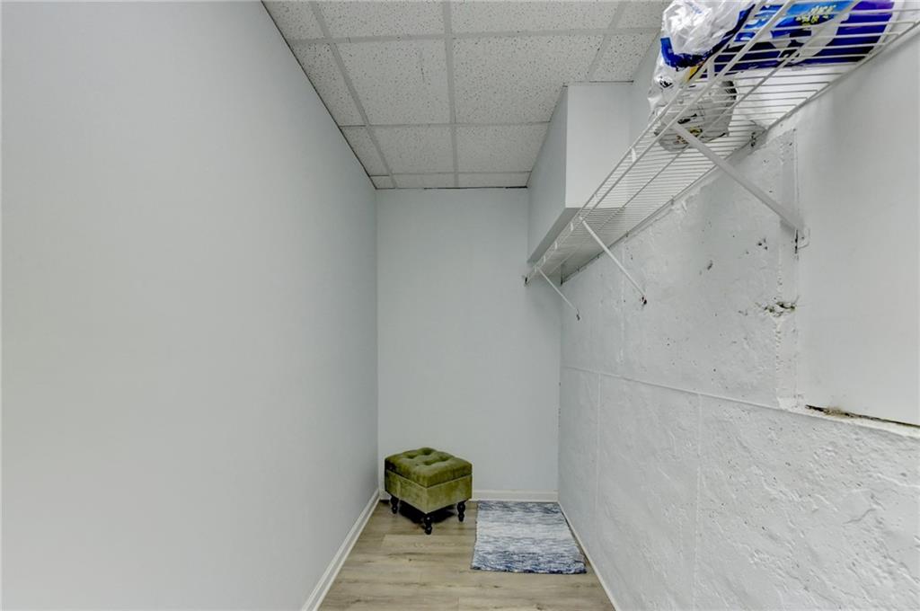 2152 Merrymount Drive Suwanee, GA 30024 - Photo 42 of 63 a view of a room with racks on the wall