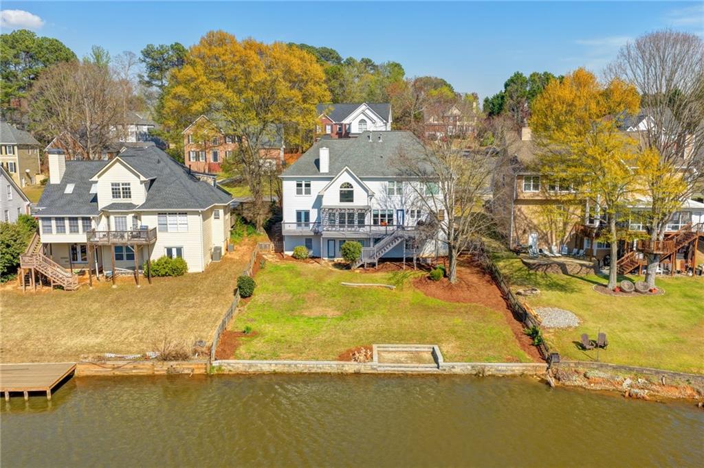 2152 Merrymount Drive Suwanee, GA 30024 - Photo 51 of 63 a view of a swimming pool with outdoor seating