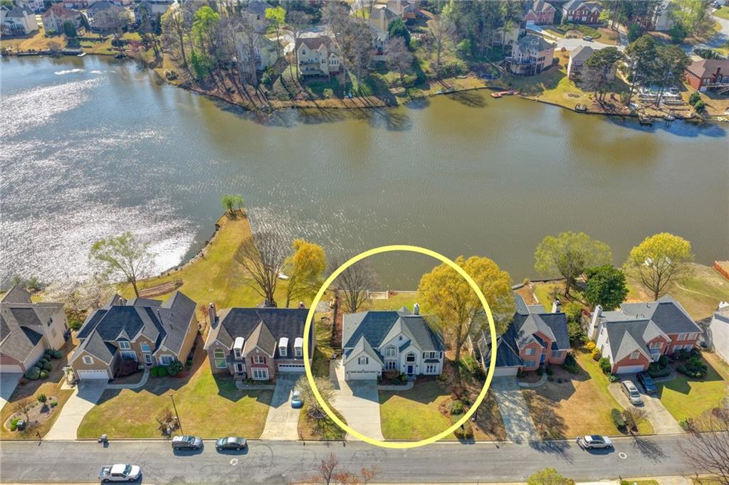 2152 Merrymount Drive Suwanee, GA 30024 - Photo 55 of 63 an aerial view of a house with swimming pool and outdoor seating