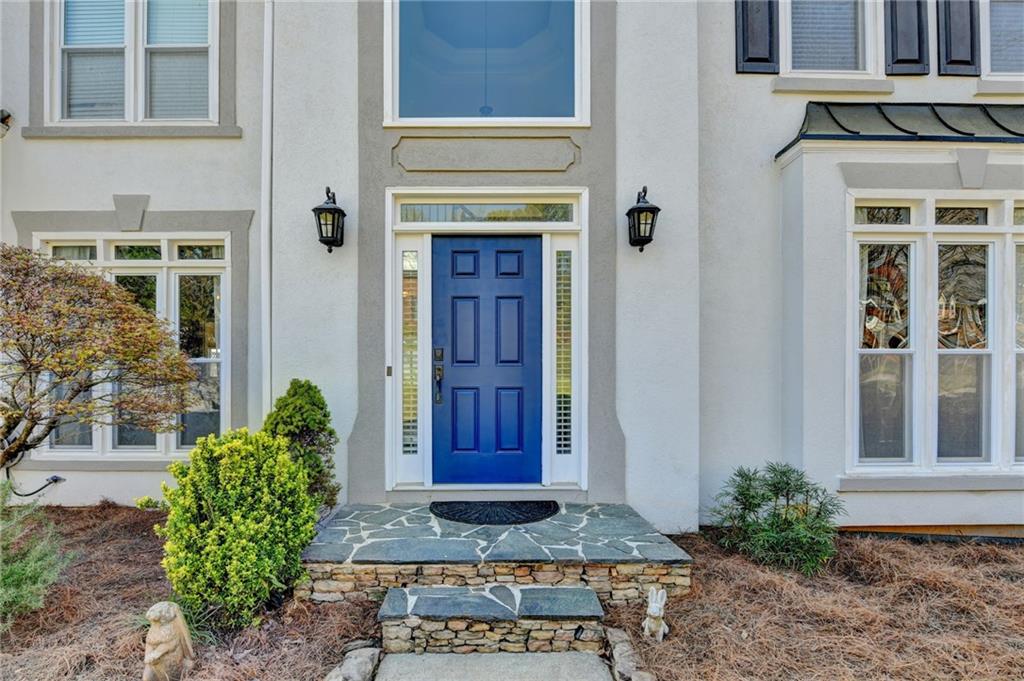 2152 Merrymount Drive Suwanee, GA 30024 - Photo 63 of 63 a view of a entryway door of the house