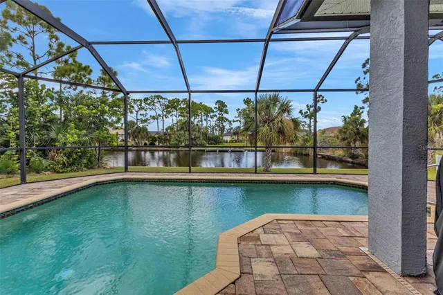 a view of a swimming pool with an outdoor space