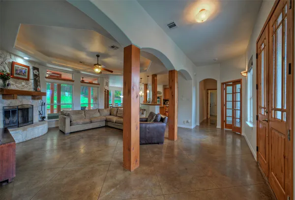 a view of livingroom with furniture and a fireplace