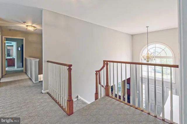 a view of a hallway with a porch