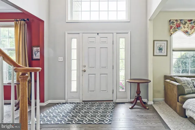 a view of livingroom with furniture and windows