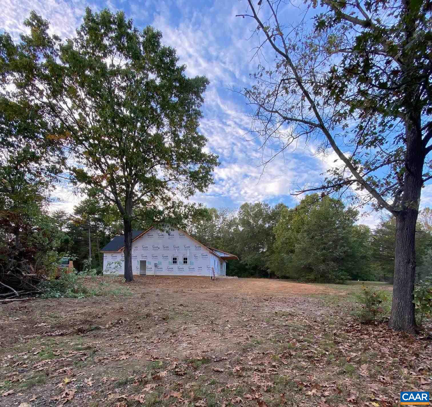 232 Troy Road Troy, VA 22974 - Photo 11 of 13 a big room with lots of trees