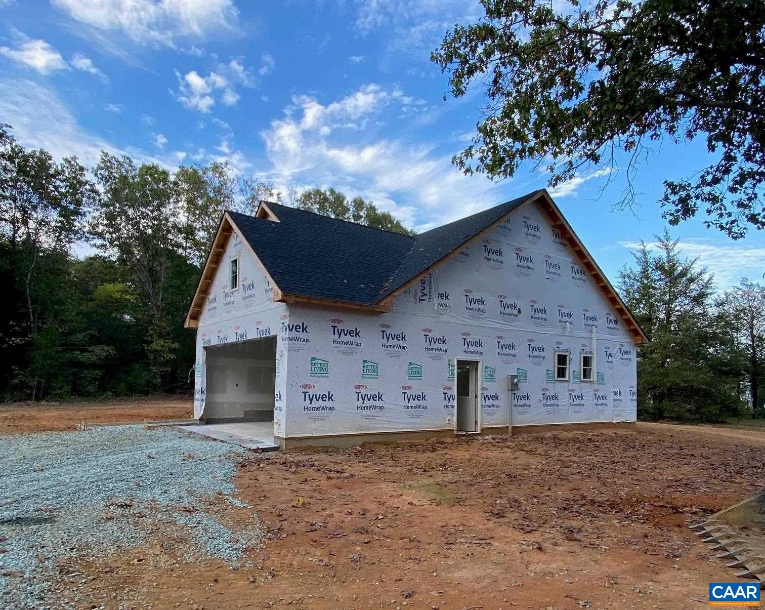 232 Troy Road Troy, VA 22974 - Photo 2 of 13 a view of a house with a yard and garage