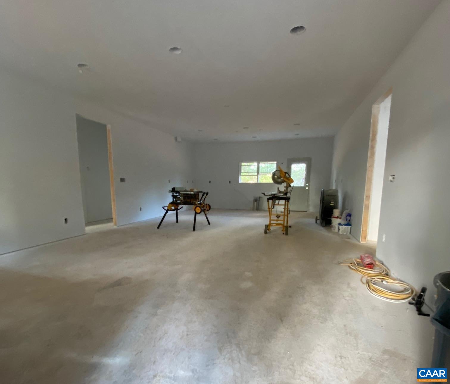 232 Troy Road Troy, VA 22974 - Photo 6 of 13 a view of living room filled with furniture and a chandelier