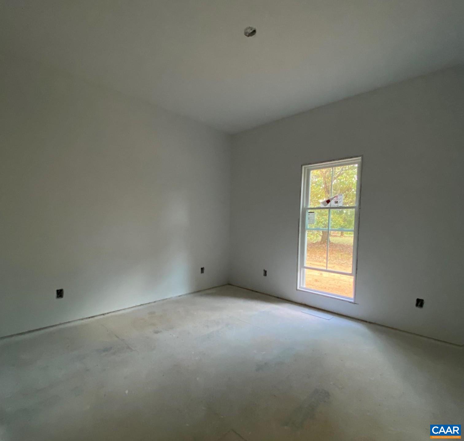 232 Troy Road Troy, VA 22974 - Photo 8 of 13 an empty room with a window