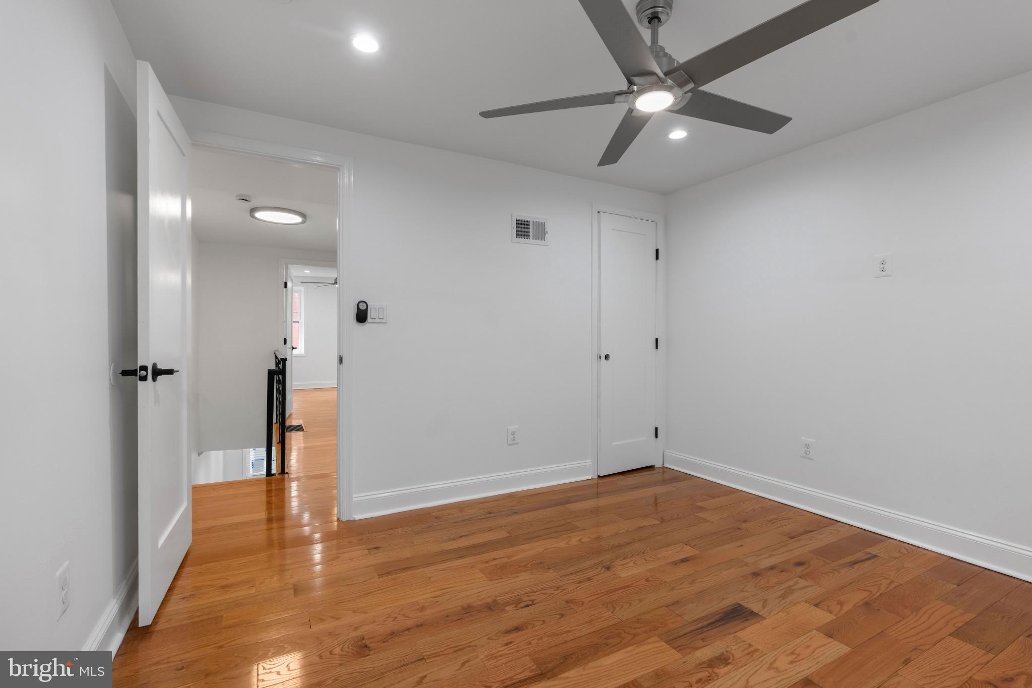 625 Winton Street Philadelphia, PA 19148 - Photo 13 of 25 a view of empty room with wooden floor