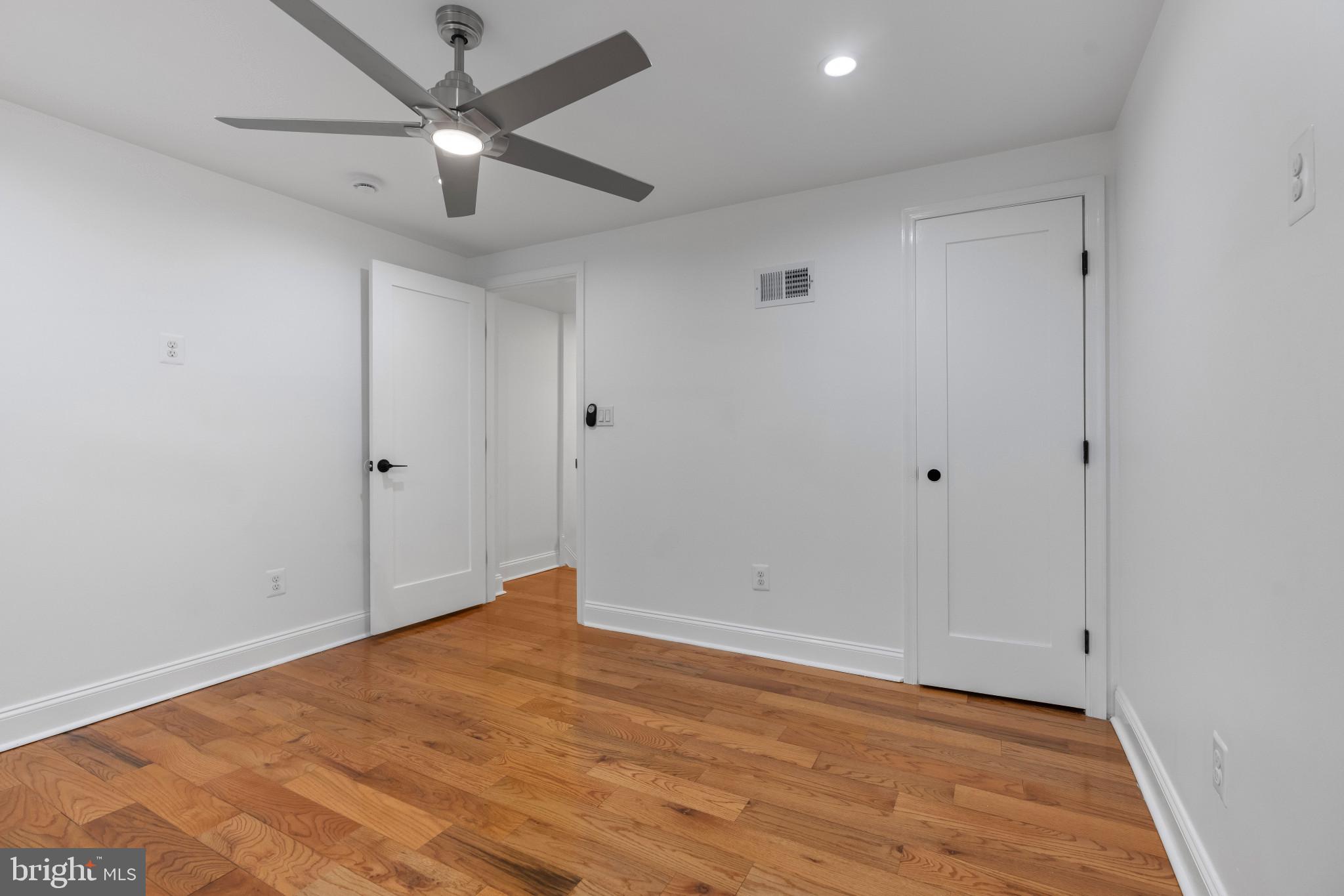 625 Winton Street Philadelphia, PA 19148 - Photo 14 of 25 wooden floor in an empty room