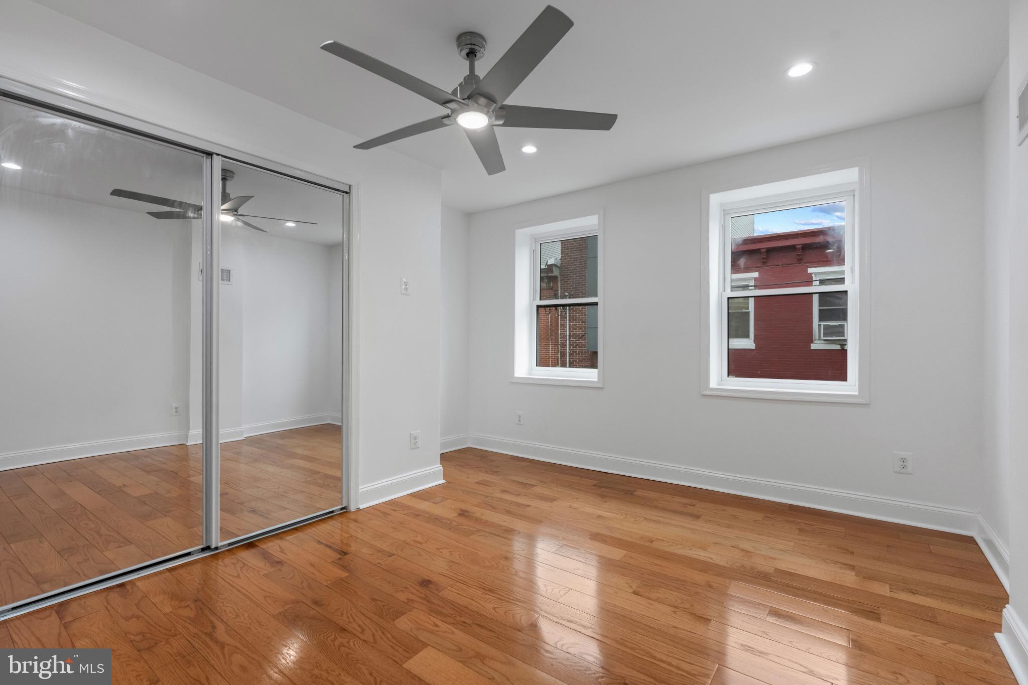 625 Winton Street Philadelphia, PA 19148 - Photo 16 of 25 a view of an empty room with a window