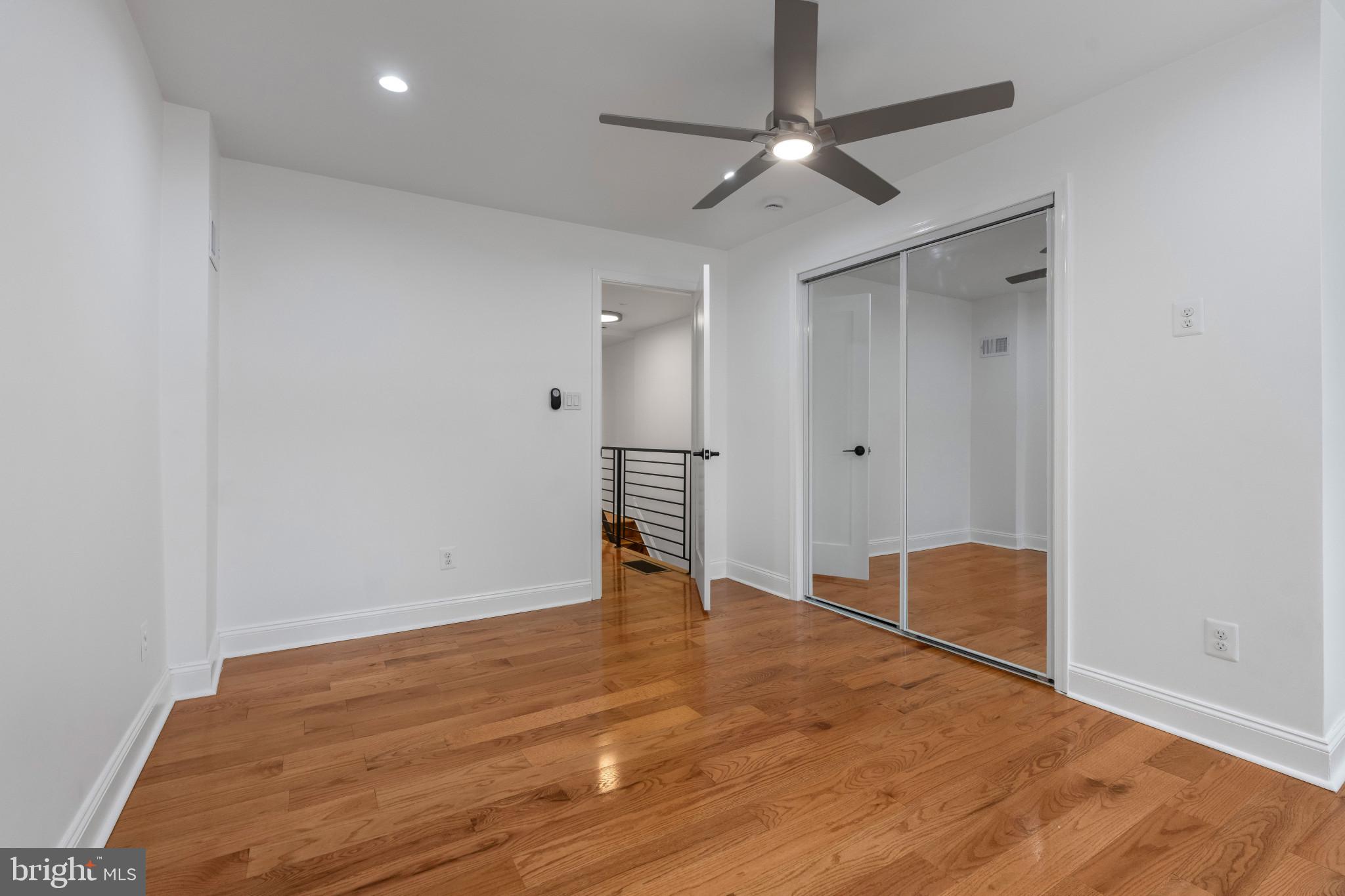 625 Winton Street Philadelphia, PA 19148 - Photo 17 of 25 a view of empty room with wooden floor