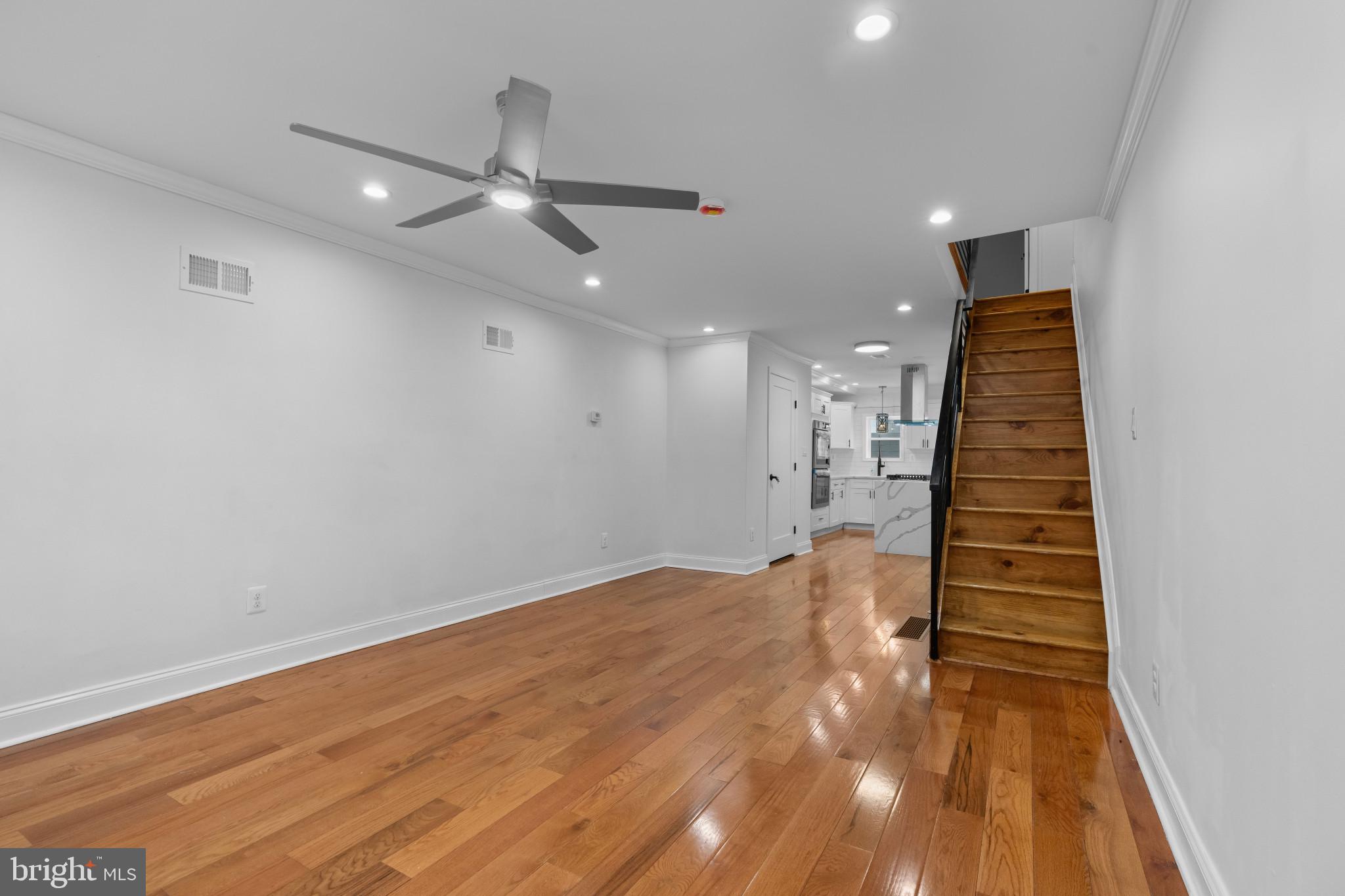 625 Winton Street Philadelphia, PA 19148 - Photo 6 of 25 an empty room with wooden floor