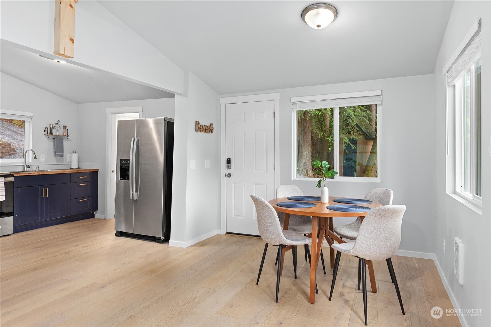 1024 South Lake Roesiger Road Snohomish, WA 98290 - Photo 11 of 35 a view of a dining room with furniture and a window