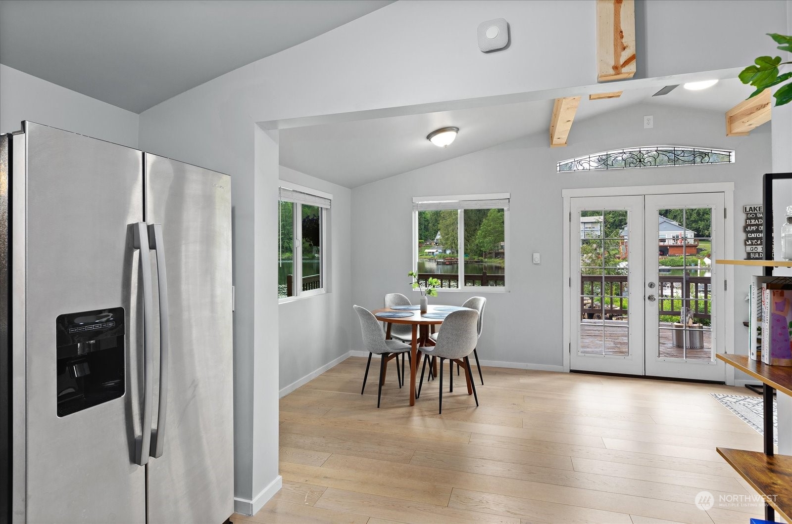 1024 South Lake Roesiger Road Snohomish, WA 98290 - Photo 12 of 35 a dining room with furniture and wooden floor