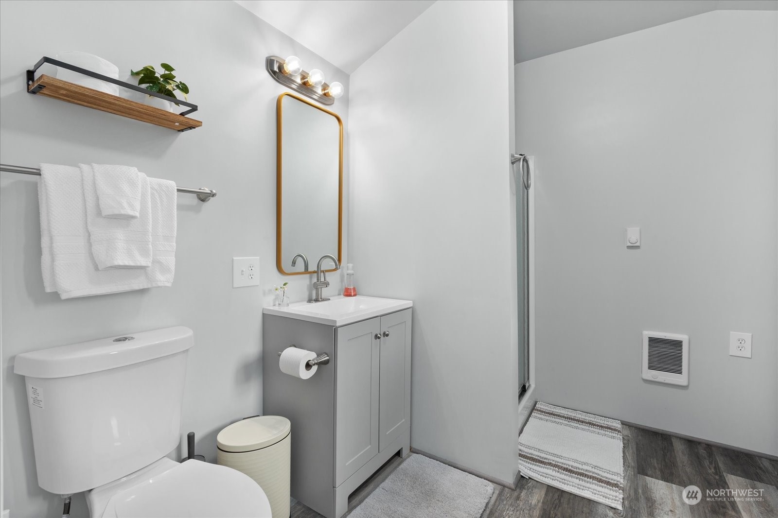 1024 South Lake Roesiger Road Snohomish, WA 98290 - Photo 19 of 35 a bathroom with a toilet a sink and mirror