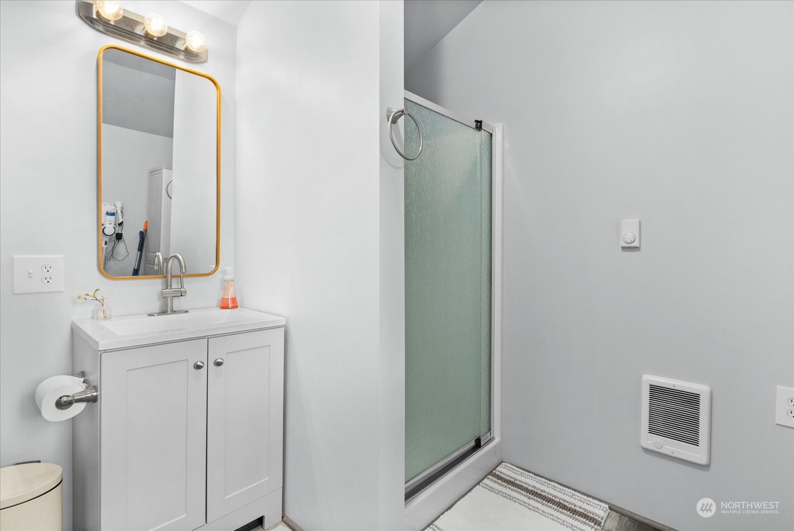 1024 South Lake Roesiger Road Snohomish, WA 98290 - Photo 20 of 35 a bathroom with a sink and mirror with toilet