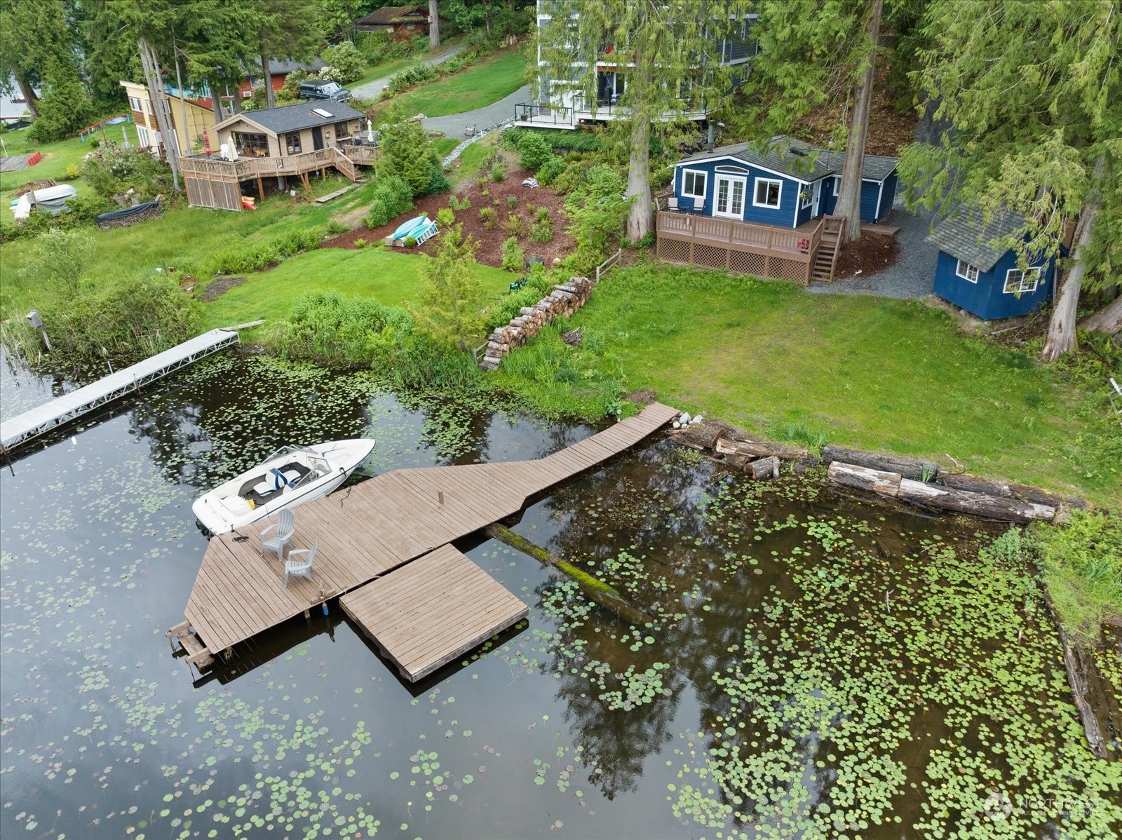 1024 South Lake Roesiger Road Snohomish, WA 98290 - Photo 25 of 35 a view of a bench in the garden