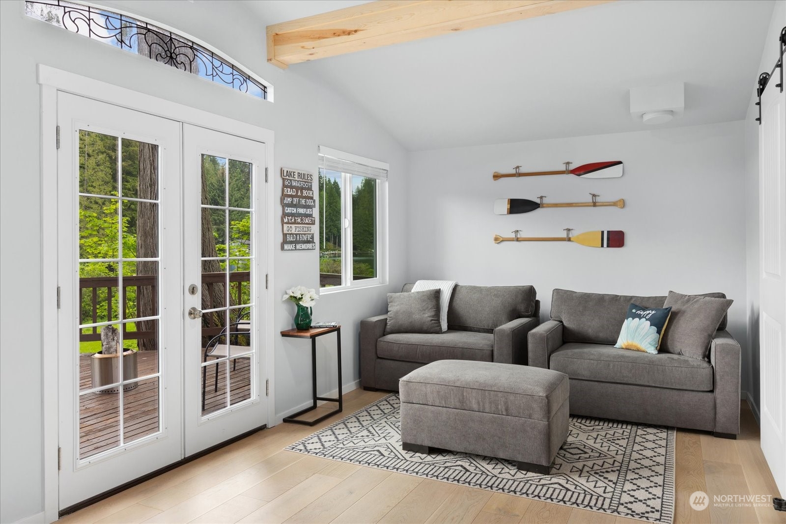 1024 South Lake Roesiger Road Snohomish, WA 98290 - Photo 7 of 35 a living room with furniture and a large window