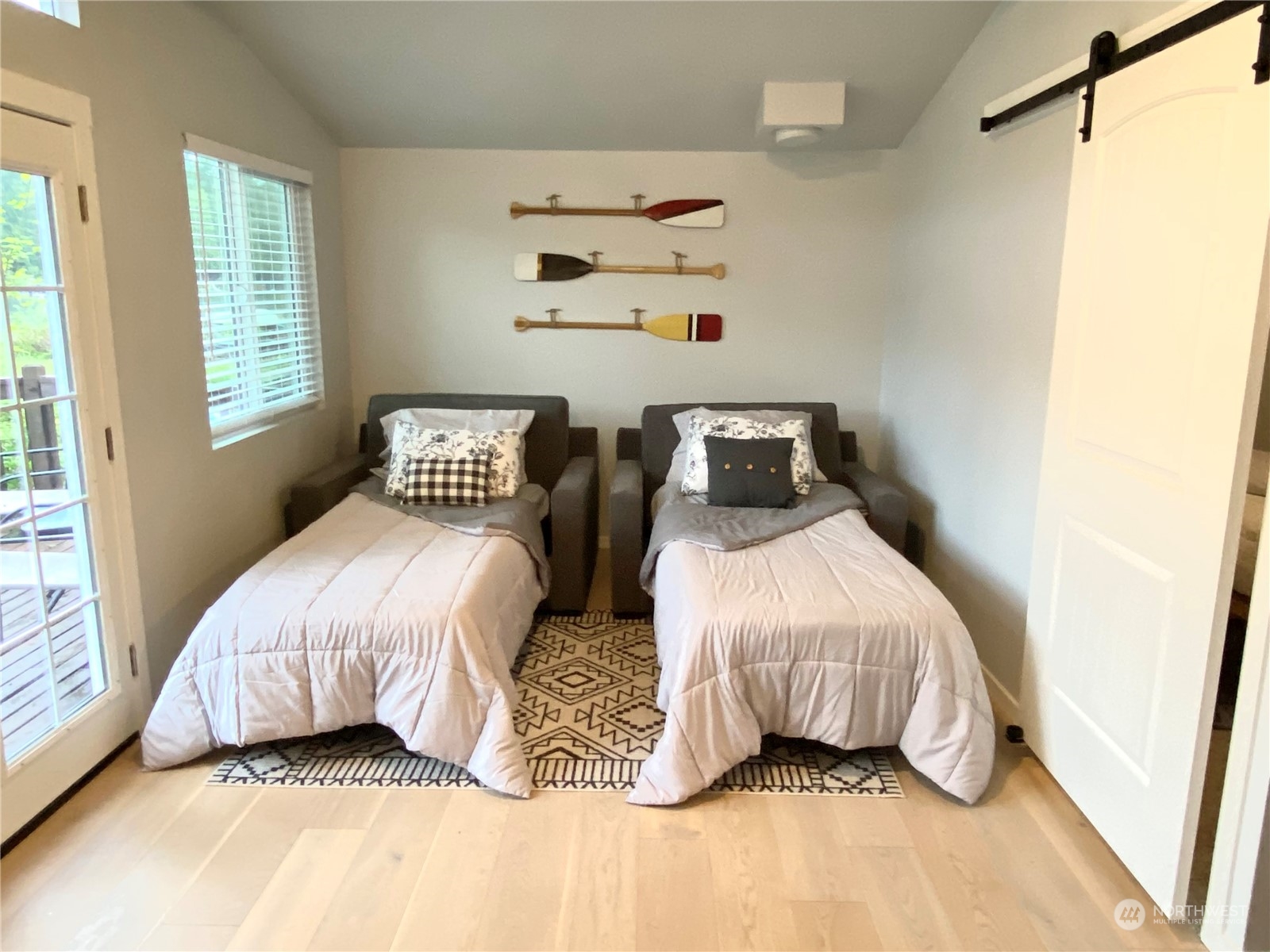 1024 South Lake Roesiger Road Snohomish, WA 98290 - Photo 9 of 35 a bedroom with a bed and a window