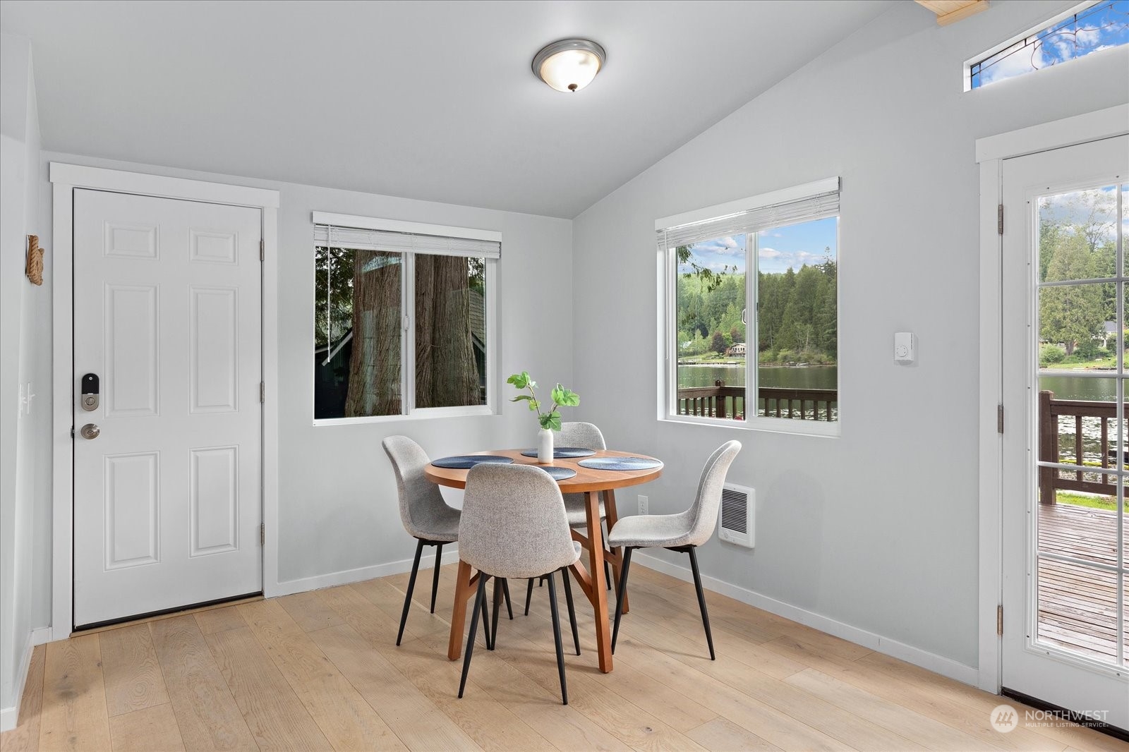 1024 South Lake Roesiger Road Snohomish, WA 98290 - Photo 10 of 35 a view of a dining room with furniture window and outside view